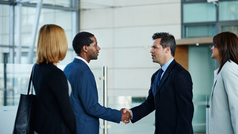 UCaaS Reseller business handshake