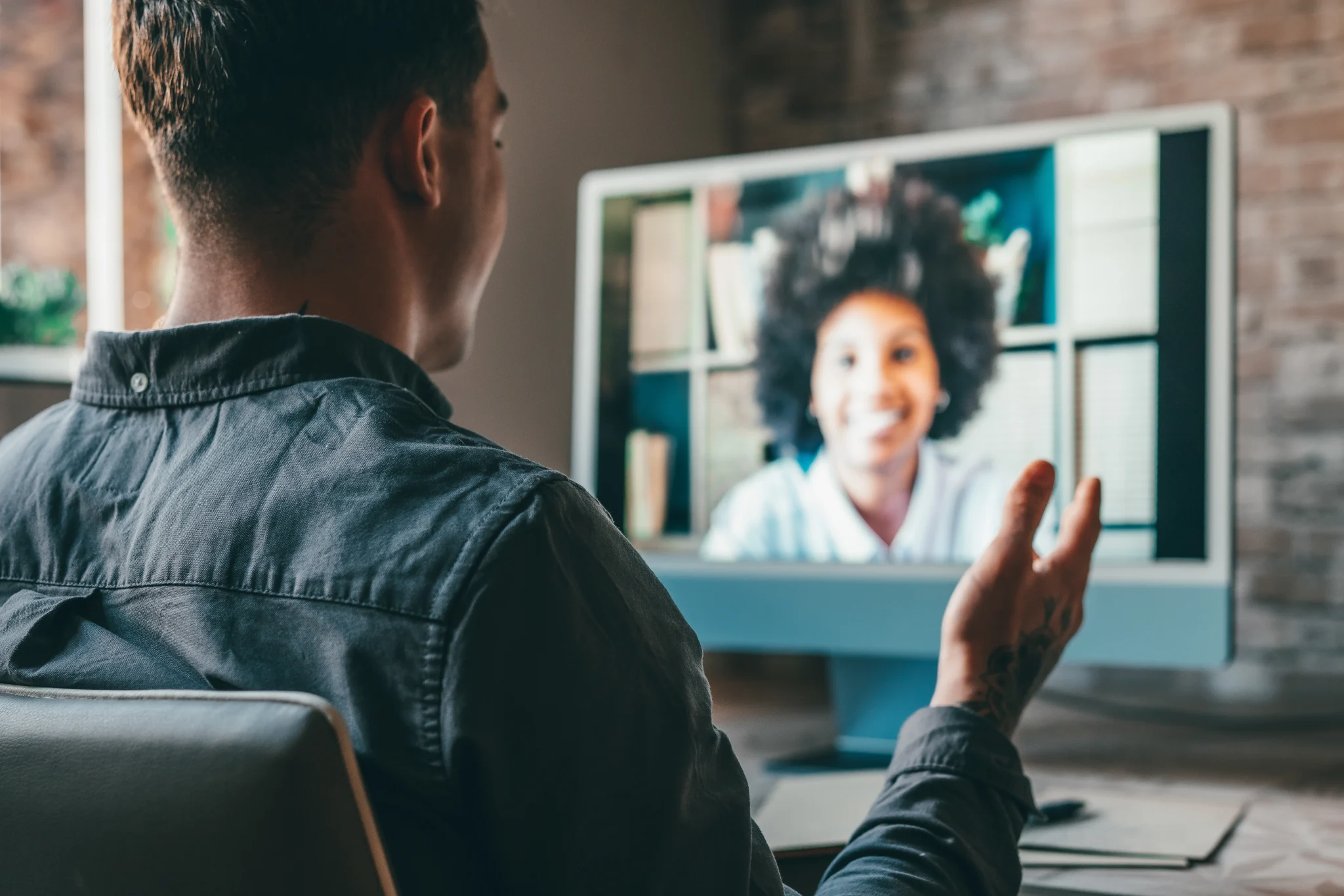 A moderator running an AxxHD video meeting